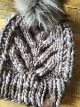 Load image into Gallery viewer, Lemon Tree Lane Adult Luxury Kettle-Dyed Malabrigo Merino Wool &quot;Char Char&quot; Cable Beanie | &quot;Sombras&quot; colorway with Cool Grey Faux-Fur Pom Pom