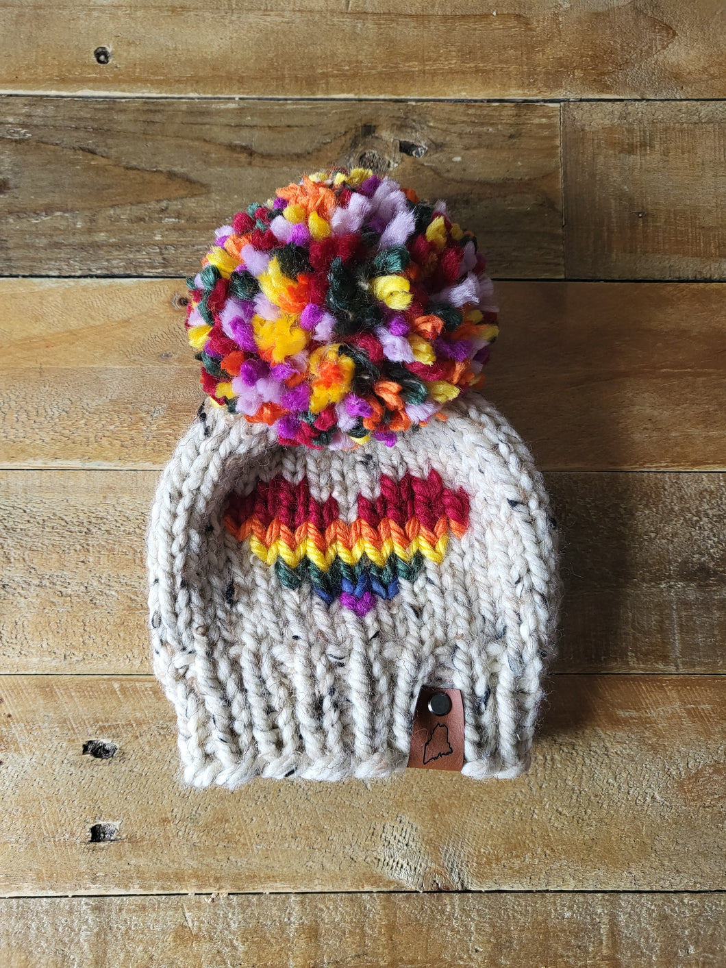 Lemon Tree Lane Baby Beanie 6-18 Months | Oatmeal Tweed with Rainbow Heart and Jumbo Rainbow Fluff Pom Pom