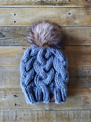 Lemon Tree Lane Adult Braided Cable Beanie  | Blue-Grey with Classic Striped Brown Faux-Fur Pom Pom