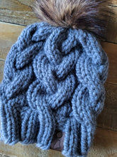 Load image into Gallery viewer, Lemon Tree Lane Adult Braided Cable Beanie  | Blue-Grey with Classic Striped Brown Faux-Fur Pom Pom