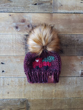 Load image into Gallery viewer, Lemon Tree Lane Baby 0-3 Months &quot;Little Red Truck&quot; Beanie | Rust Tones with Design on Front of the Iconic Red Truck carrying a Christmas Tree/Caramel Faux-Fur Pom Pom