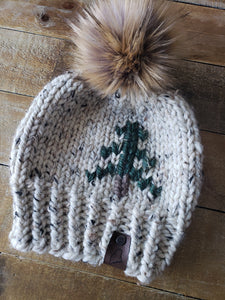 Lemon Tree Lane Youth 4-8 Years Rustic Pines Hat | Oatmeal Tweed with Pine Tree Design/Eclipse Faux Fur Pom Pom