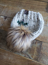 Load image into Gallery viewer, Lemon Tree Lane Baby 3-6 Months Rustic Pines Hat | Oatmeal Tweed with Pine Tree Design/Eclipse Faux Fur Pom Pom