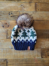 Load image into Gallery viewer, Lemon Tree Lane Adult Wintry Pines Hat | Navy Blue Brim with Pine Tree Design/Classic Striped Brown Faux Fur Pom Pom