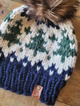 Load image into Gallery viewer, Lemon Tree Lane Adult Wintry Pines Hat | Navy Blue Brim with Pine Tree Design/Classic Striped Brown Faux Fur Pom Pom