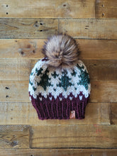 Load image into Gallery viewer, Lemon Tree Lane Adult Wintry Pines Hat | Claret Brim with Pine Tree Design/Classic Striped Brown Faux Fur Pom Pom